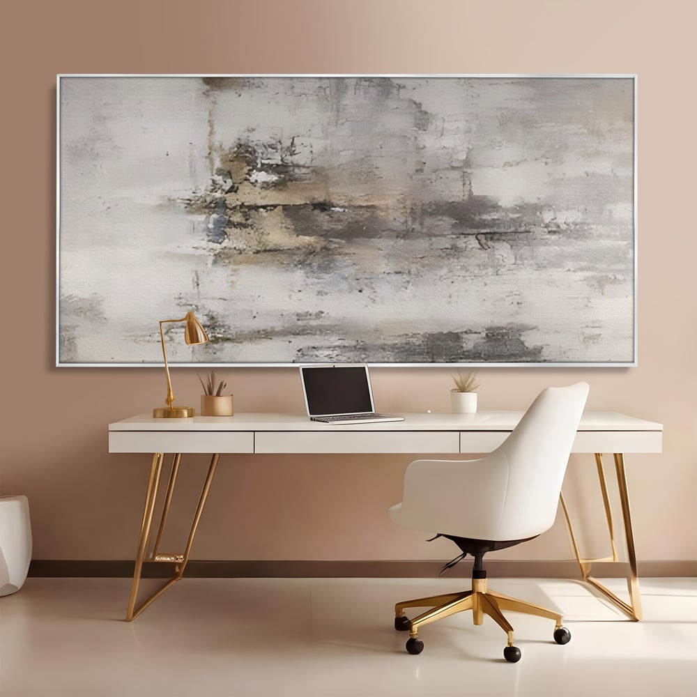 Tablou canvas cu pictura abstracta cu texturi gri si bronz, in rama de aluminiu argintiu, pe perete intr-un birou